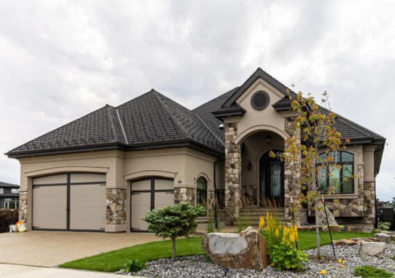 Met Exterior's stone and stucco work on a residential home in Edmonton's Windemere area.